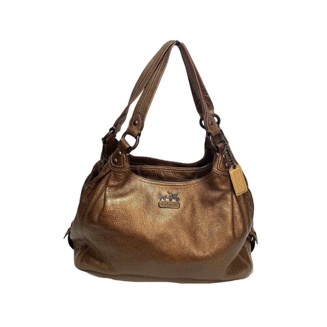 Coach bronze leather offers shoulder bag, zip closure, in good pre-owned condition.