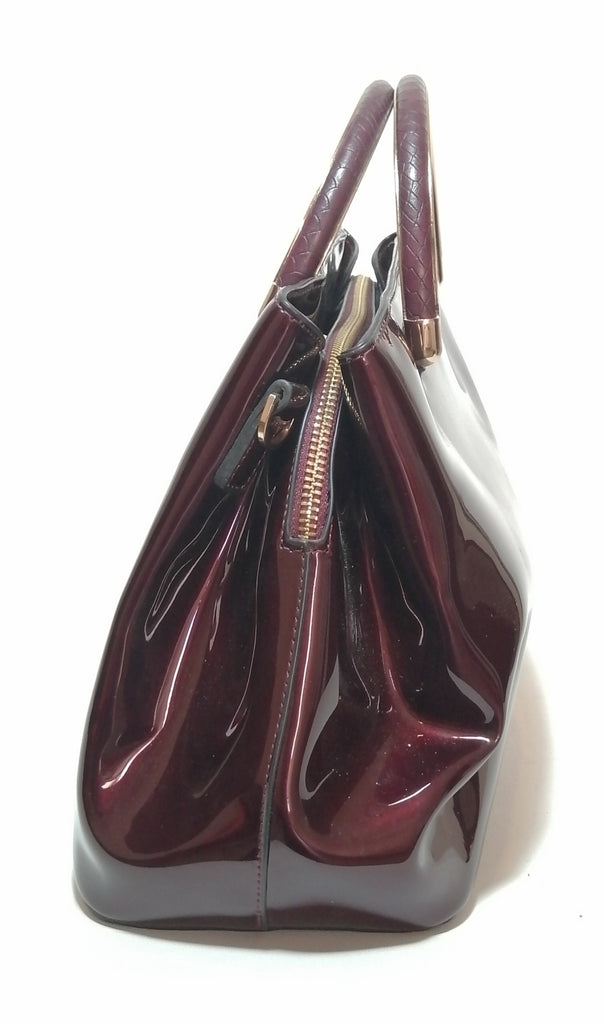 DUNE Oxblood Patent Satchel