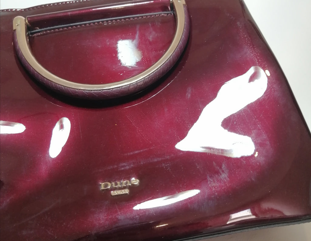 DUNE Oxblood Patent Satchel